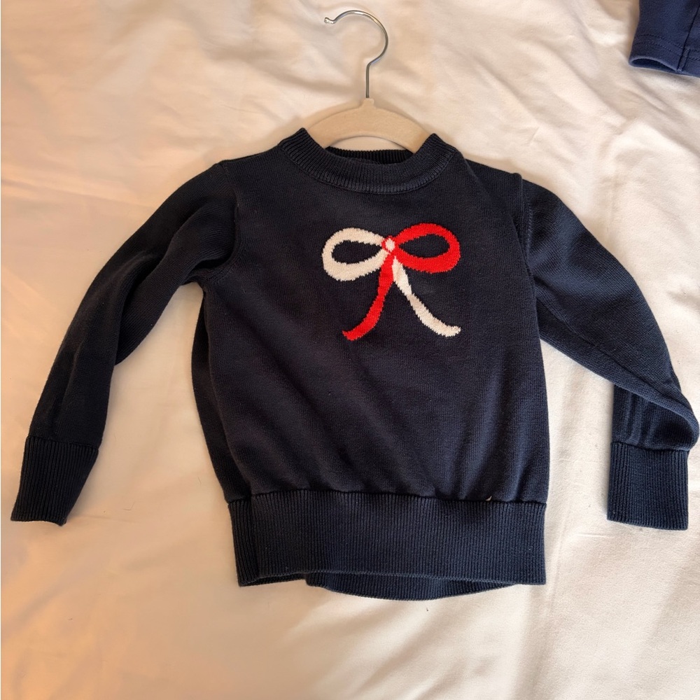 The Beaufort Bonnet Company Navy Sweater with Red and White Bow